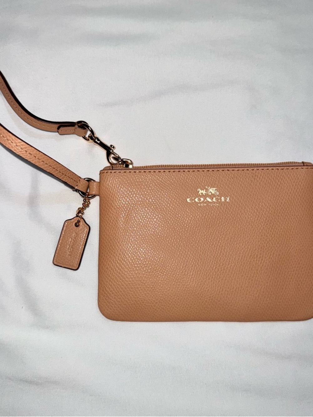 COACH Pebbled Leather Wristlet in Camel